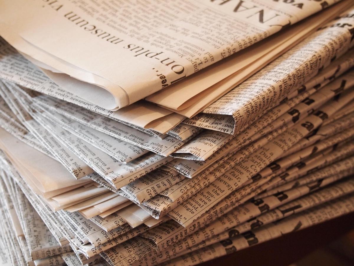 Press freedom Media House International Reporters Sans Frontieres – photo of a stack of newspapers